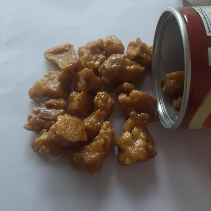 Krishna Hing Ras Whole tin opened, showing whole hing